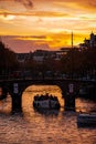 Canals in Amsterdam, the Netherlands during beautiful and colorful sunset Royalty Free Stock Photo