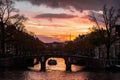 Canals in Amsterdam, the Netherlands during beautiful and colorful sunset Royalty Free Stock Photo