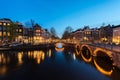 Canals of Amsterdam at night. Amsterdam is the capital and most Royalty Free Stock Photo