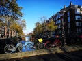 Canals, bikes and houses of Amsterdam city, in Holland, Netherlands Royalty Free Stock Photo