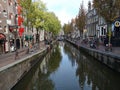 Canals, bridge, bike and houses of Amsterdam city, in Holland, Netherlands Royalty Free Stock Photo