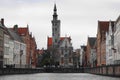 The canals of Brugge with Jan Van Eyck Square in Bruges Belgium Royalty Free Stock Photo