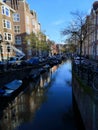 Canals and houses of Amsterdam city, in Holland, Netherlands Royalty Free Stock Photo