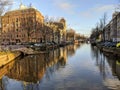 Canals and houses of Amsterdam city, in Holland, Netherlands Royalty Free Stock Photo