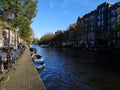 Canals and houses of Amsterdam city, in Holland, Netherlands Royalty Free Stock Photo