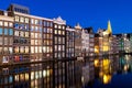 Canals and tradition house in Amsterdam at night. Amsterdam is t