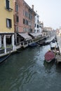 The canal in Venice with gondolas and boats, traditional vehicels of transport in Venice, Italy Royalty Free Stock Photo
