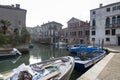 The canal in Venice with gondolas and boats, traditional vehicels of transport in Venice, Italy Royalty Free Stock Photo