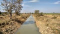 Canals are waterways channels, or artificial waterways, for water conveyance, or to service water transport vehicles.