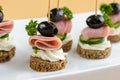 Canape with bacon and olive Royalty Free Stock Photo