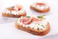 Canape with cheese and prosciutto