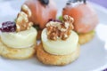 Canape or chesse canape with walnut topping