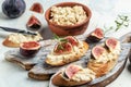 Canape or crostini with figs and goat cheese, Italian Bruschetta Menu, recipe Royalty Free Stock Photo