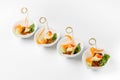 Canape dish with meat, cheese, cucumber, carrots and herbs. Concept of catering, hospitality and lifestyle Royalty Free Stock Photo