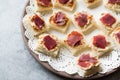 Canape with Pastrami / Pastirma Ham and Hummus on Small Square Bread. Royalty Free Stock Photo