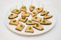 Canape with smoked fish, cream cheese and dill on rye bread Royalty Free Stock Photo