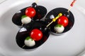 Canape with tomato and mozarella Royalty Free Stock Photo