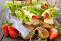 Canapes with cheese and strawberries