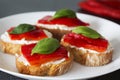 Canapes with roasted peppers, cream cheese and basil Royalty Free Stock Photo