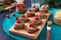 Canapes with rye bread, liver pate, cherry tomatoes. Breakfast snack Royalty Free Stock Photo