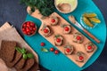 Canapes with rye bread, liver pate, cherry tomatoes. Breakfast snack. Top view