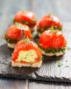 Canapes with salmon and curd cheese