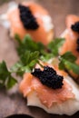 Canapes with smoked salmon and caviar Royalty Free Stock Photo