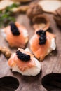 Canapes with smoked salmon and caviar Royalty Free Stock Photo