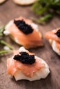 Canapes with smoked salmon and caviar Royalty Free Stock Photo