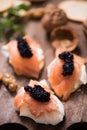 Canapes with smoked salmon and caviar Royalty Free Stock Photo