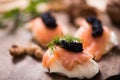 Canapes with smoked salmon and caviar Royalty Free Stock Photo