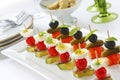 Canapes on toothpicks , pinchos