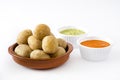 Canarian potatoes (papas arrugadas) with mojo sauce isolated Royalty Free Stock Photo