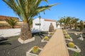 Canary style buildings and tropical plants in La Oliva village Heritage Art Center, Fuerteventura, Canary Islands, Spain Royalty Free Stock Photo