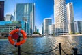 Canary Wharf financial district of London skyscrapers and canal view Royalty Free Stock Photo