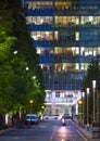 Canary Wharf office's windows lit up at dusk, Business life concept background Royalty Free Stock Photo