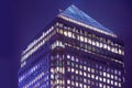 Canary Wharf office's windows lit up at dusk, Business life concept background Royalty Free Stock Photo