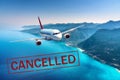 Canceled flights. Fying passenger aircraft over the sea Royalty Free Stock Photo