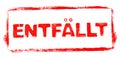 Red stencil frame: Cancelled banner in german language Royalty Free Stock Photo