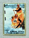 Cancelled postage stamp printed by Ajman, that shows Kayak, Summer Olympics, Munich