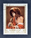 Cancelled postage stamp printed by Ajman, that shows Painting Boy Playing a Recorder by Hendrick Jansz ter Brugghen Royalty Free Stock Photo