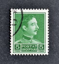 Cancelled postage stamp printed by Albania, that shows portrait of King Zog I of Albania
