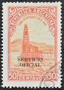 Cancelled postage stamp printed by Argentina, that shows Oil well, overprinted