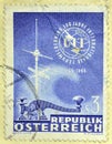 Cancelled postage stamp printed by Austria, that shows Antenna and telegraph