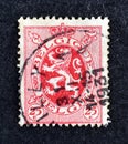 Cancelled postage stamp printed by Belgium, that shows coat of arms, Royalty Free Stock Photo