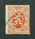 Cancelled postage stamp printed by Belgium, that shows coat of arms Royalty Free Stock Photo