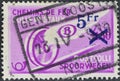 Cancelled postage stamp printed by Belgium, that shows Railway Stamp: Winged Wheel with Surcharge