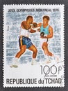 Cancelled postage stamp printed by Chad, that shows Boxing