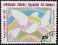 Cancelled postage stamp printed by Comoros, that shows Painting The Dove and the Rainbow by Pablo Picasso