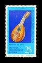 Cancelled postage stamp printed by East Germany, that shows musical instrument Mandolin